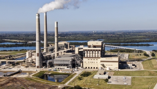 epa09556938 An aerial photo made with a drone shows gasses burning off near oil storage tanks in San Antonio, Texas, 31 October 2021. World leaders are meeting in the United Nations Climate Change Conference of the Parties (COP26) in Glasgow, Scotland to address reductions in carbon emissions and global warming.  EPA/TANNEN MAURY