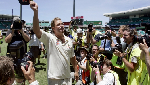 FILE - In this Jan. 5, 2007, file photo, Australian bowler Shane Warne waves as he leaves the field in his last match following their win over of England in the fifth and final Ashes cricket test in Sydney, Australia. Shane Warne, one of the greatest cricket players in history, has died. He was 52. Fox Sports television, which employed Warne as a commentator, quoted a family statement as saying he died of a suspected heart attack in Koh Samui, Thailand, Friday March 4. (AP Photo/Mark Baker,File)