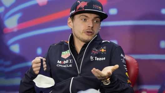 Red Bull driver Max Verstappen of the Netherlands speaks ahead of a press conference at the Formula One Bahrain International Circuit in Sakhir, Bahrain, Friday, March 18, 2022. The Bahrain Formula One Grand Prix will take place here on Sunday. (AP Photo/Hassan Ammar)