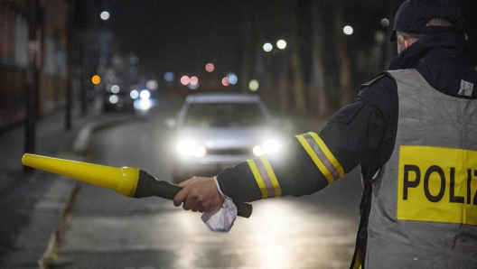 Servizio di controllo della Polizia Stradale per il contrasto alle stragi del Sabato sera, Milano, Piazza Serafino Belfanti, 26 Gennaio 2022,  ANSA/Andrea Fasani