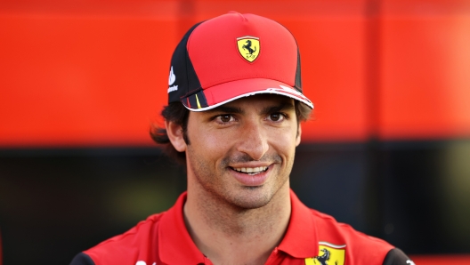 MELBOURNE, AUSTRALIA - APRIL 07: Carlos Sainz of Spain and Ferrari looks on in the Paddock during previews ahead of the F1 Grand Prix of Australia at Melbourne Grand Prix Circuit on April 07, 2022 in Melbourne, Australia. (Photo by Robert Cianflone/Getty Images)