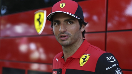 Ferrari driver Carlos Sainz of Spain arrives at the track ahead of the Australian Formula One Grand Prix in Melbourne, Australia, Thursday, April 7, 2022. (AP Photo/Asanka Brendon Ratnayake)