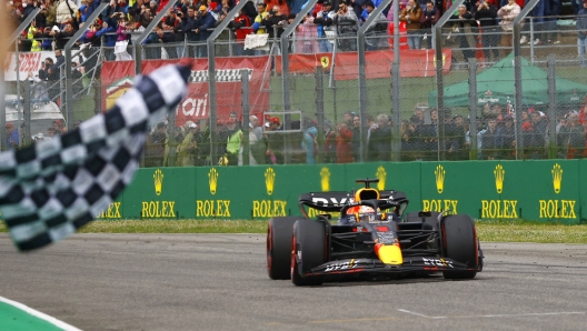 Red Bull driver Max Verstappen of the Netherlands crosses the finish line as he wins the Emilia Romagna Formula One Grand Prix, at the Enzo and Dino Ferrari racetrack in Imola, Italy, Sunday, April 24, 2022. (Guglielmo Mangiapane, Pool via AP)