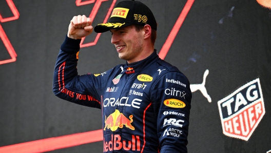 IMOLA, ITALY - APRIL 24: Race winner Max Verstappen of the Netherlands and Oracle Red Bull Racing celebrates on the podium during the F1 Grand Prix of Emilia Romagna at Autodromo Enzo e Dino Ferrari on April 24, 2022 in Imola, Italy. (Photo by Clive Mason/Getty Images)