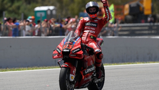 Ducati Italian rider Francesco Bagnaia celebrates after crossing the finish line in the MotoGP Spanish Grand Prix at the Jerez racetrack in Jerez de la Frontera on May 1, 2022. (Photo by JORGE GUERRERO / AFP)