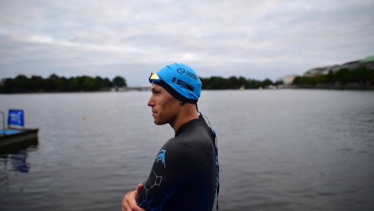 HAMBURG, GERMANY - SEPTEMBER 19: An athlete prepares himself during the Age Group Olympic Distance swim leg at the World Triathlon Championship Series Hamburg 2021 on September 19, 2021 in Hamburg, Germany. (Photo by Alexander Koerner/Getty Images for World Triathlon Series)