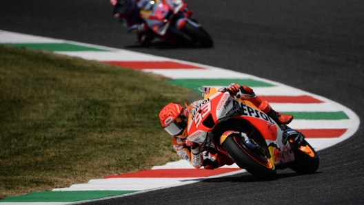 Repsol Honda Team Spain's Marc Marquez rides during a second free practice session ahead the Italian Moto GP Grand Prix at the Mugello race track, Tuscany, on May 27, 2022. (Photo by Filippo MONTEFORTE / AFP)