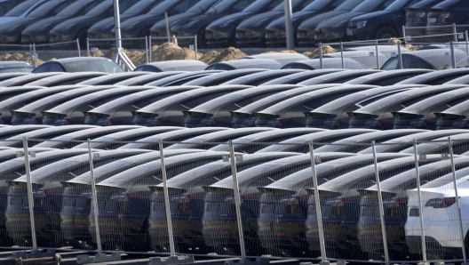 Tesla cars are parked at the new Tesla Gigafactory for electric cars in Gruenheide near Berlin, Germany, Tuesday, March 22, 2022. Electric car manufacturer Tesla is opening its first European factory on the outskirts of Berlin in an effort to challenge German automakers on their home turf. The company says its new "Gigafactory" will employ 12,000 people and produce 500,000 vehicles a year. (AP Photo/Michael Sohn)