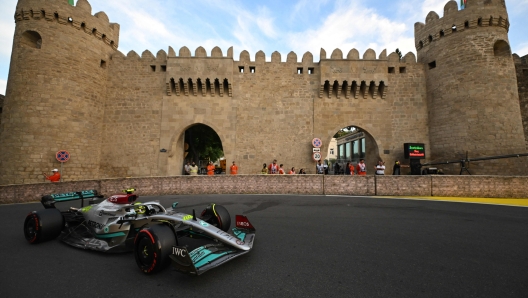 Mercedes' British driver Lewis Hamilton steers his car during the qualifying session for the Formula One Azerbaijan Grand Prix at the Baku City Circuit in Baku on June 11, 2022. (Photo by NATALIA KOLESNIKOVA / AFP)