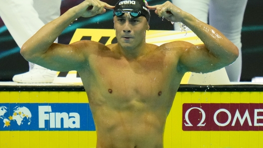 Nicolo Martinenghi of Italy reacts after winning the Men 100m Breaststroke final at the 19th FINA World Championships in Budapest, Hungary, Sunday, June 19, 2022. (AP Photo/Petr David Josek)