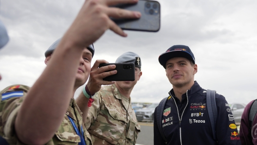 Red Bull driver Max Verstappen of the Netherlands poses for pictures as he arrives at the Silverstone race track in Silverstone, Thursday, June 30, 2022. The British F1 Grand Prix is held on Sunday July 3,2022. (AP Photo/Frank Augstein)