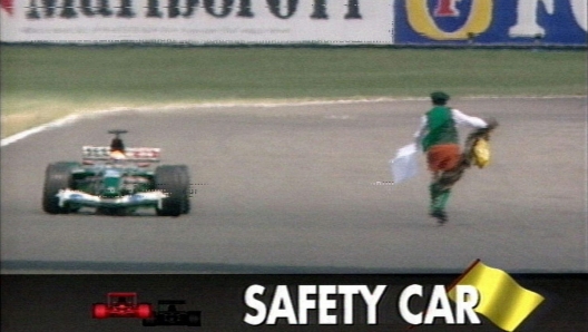 ATENE 2004: MARATONA; UOMO SUL PERCORSO, SPINGE VIA LEADER
BRASILIANO VANDERLEI HA PERSO ALCUNI SECONDI PER IRRUZIONE-  Screen grab from English television station ITV Sport showing a man running onto the track at the Silverstone racing circuit Sunday 20July  2003 during the course of the F1 British Grand Prix. The man who was reportedly Father Cornelius Horan, an Irish priest, shoved off Brazilian Vanderlei Lima during the men's marathon at the Olympic Games 2004 in Athens on Sunday, 29 August 2004. Horan, 57, is known to promote world peace with unconventional methods.  ANSA /INTERNET OUT /JI