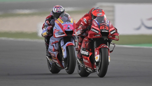 DOHA, QATAR - MARCH 05: Francesco Bagnaia of Italy and Ducati Lenovo Team leads Enea Bastianini of Italy and Gresini Racing MotoGP  during the MotoGP of Qatar - Qualifying at Losail Circuit on March 05, 2022 in Doha, Qatar. (Photo by Mirco Lazzari gp/Getty Images,)