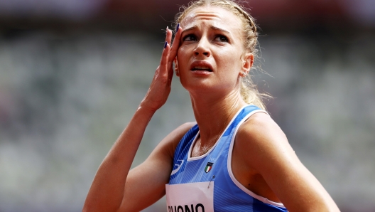 epa09386459 Federica del Buono of Italy after competing in the Women's 1500m heats at the Athletics events of the Tokyo 2020 Olympic Games at the Olympic Stadium in Tokyo, Japan, 02 August 2021.  EPA/VALDRIN XHEMAJ