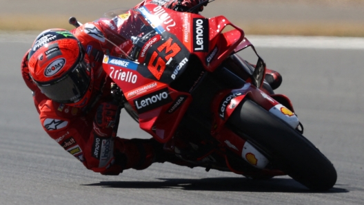 Ducati Lenovo's Italian rider Francesco Bagnaia leads during the MotoGP race of the British Grand Prix at Silverstone circuit in Northamptonshire, central England, on August 7, 2022. (Photo by ADRIAN DENNIS / AFP)