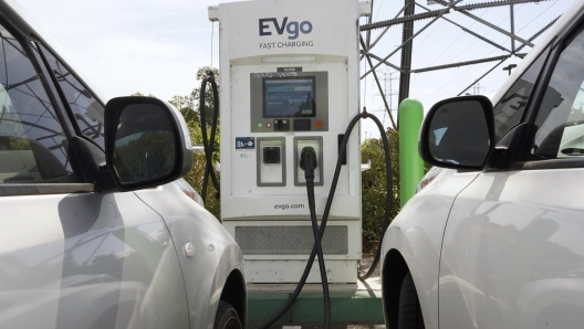 Electric cars are parked at a charging station in Sacramento, Calif., Wednesday, April 13, 2022. California wants electric vehicle sales to triple in the next four years to 35% of all new car purchases. Regulations passed Tuesday, April 12, 23022, by the California Air Resources Board set a roadmap for the state to achieve California Gov. Gavin Newsom's ambitious goal of phasing out the sale of new gas powered cars. The draft must go through a months-long state regulatory process and get approval from the U.S. EPA. (AP Photo/Rich Pedroncelli)