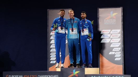 MUNICH, GERMANY - AUGUST 19: (L-R) Silver medalist Ahmed Abdelwahed of Italy, Gold medalist Topi Raitanen of Finland and Bronze medalist Osama Zoghlami of Italy pose on the podium during the Athletics - Men's 3000m Steeplechase Medal Ceremony on day 9 of the European Championships Munich 2022 at Olympiapark on August 19, 2022 in Munich, Germany. (Photo by Maja Hitij/Getty Images)