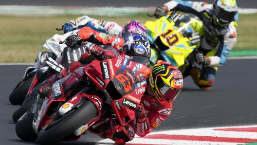 Italian rider Francesco Bagnaia of the Ducati Lenovo Team steers his motorcycle during the MotoGP race of the San Marino Motorcycle Grand Prix at the Misano circuit in Misano Adriatico, Italy, Sunday, Sept. 4, 2022. (AP Photo/Antonio Calanni)