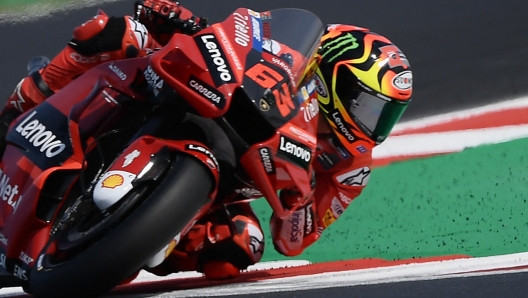 Ducati Lenovo's Italian rider Francesco Bagnaia competes during the San Marino MotoGP race at the Misano World Circuit Marco-Simoncelli in Misano Adriatico on September 4, 2022. (Photo by Filippo MONTEFORTE / AFP)