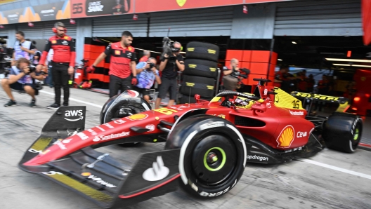 Ferrari's Monegasque driver Charles Leclerc steers his car in the pit lane during the first practice session ahead of the Italian Formula One Grand Prix at the Autodromo Nazionale circuit in Monza on September 9, 2022. (Photo by ANDREJ ISAKOVIC / AFP)