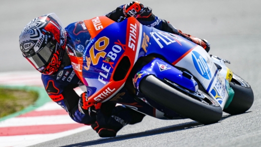 epa09993669 Spanish Moto2 rider Aron Canet, of Flexbox HP40 team, takes a bend during a free practice for the Catalonia Grand Prix race at Circuit de Barcelona-Catalunya track, in Montmelo, Barcelona, northeastern Spain, 03 June 2022. The Motorcycling Grand Prix of Catalonia will take place on 05 June 2022.  EPA/ENRIC FONTCUBERTA