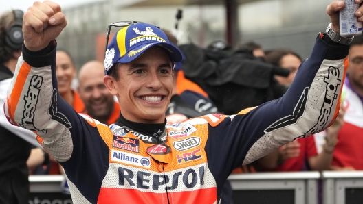 Spanish MotoGP rider Marc Marquez celebrates after capturing pole position during the qualifying round of the Japanese Motorcycle Grand Prix at the Twin Ring Motegi circuit in Motegi, north of Tokyo Saturday, Sept. 24, 2022.(AP Photo/Shuji Kajiyama)