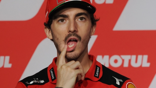 Ducati Lenovo team rider Francesco Bagnaia of Italy listens to a question during a pre-event press conference at the MotoGP Japanese Grand Prix in the Twin Ring Motegi circuit in Motegi, Tochigi prefecture on September 22, 2022. (Photo by Toshifumi KITAMURA / AFP)