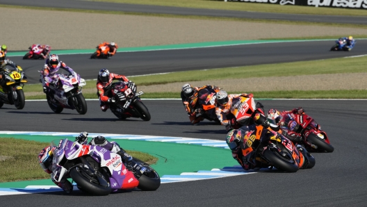 Spanish rider Jorge Martin of Prima Pramac Racing, left, leads the packs during the MotoGP race of the Japanese Motorcycle Grand Prix at the Twin Ring Motegi circuit in Motegi, north of Tokyo Sunday, Sept. 25, 2022. (AP Photo/Shuji Kajiyama)