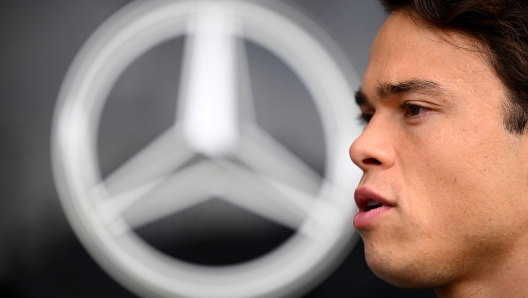 SUZUKA, JAPAN - OCTOBER 08: Nyck de Vries of Netherlands, Mercedes Test and Reserve Driver looks on after being announced as a 2023 F1 driver with the Scuderia AlphaTauri team in the Paddock prior to final practice ahead of the F1 Grand Prix of Japan at Suzuka International Racing Course on October 08, 2022 in Suzuka, Japan. (Photo by Clive Mason/Getty Images)