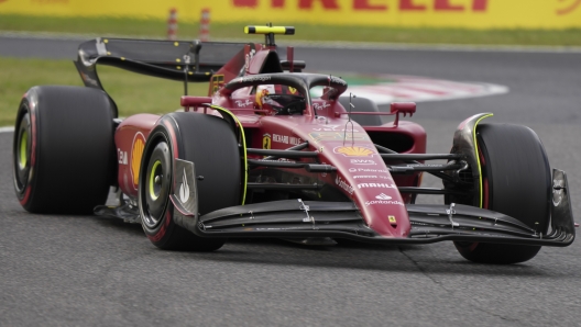 Ferrari driver Carlos Sainz of Spain steers his car during the qualifying session of Japanese Formula One Grand Prix at the Suzuka Circuit in Suzuka, central Japan, Saturday, Oct. 8, 2022. (AP Photo/Eugene Hoshiko)