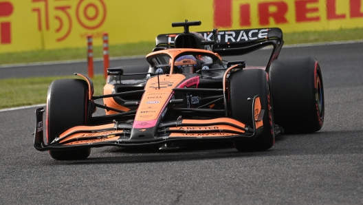 McLaren's Australian driver Daniel Ricciardo takes part in the qualifying session ahead of the Formula One Japanese Grand Prix at Suzuka, Mie prefecture on October 8, 2022. (Photo by Philip FONG / AFP)