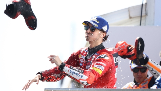 PHILLIP ISLAND, AUSTRALIA - OCTOBER 16: Francesco Bagnaia of Italy and of Ducati Lenovo Team celebrates third place during the MotoGP of Australia at Phillip Island Grand Prix Circuit on October 16, 2022 in Phillip Island, Australia. (Photo by Robert Cianflone/Getty Images)