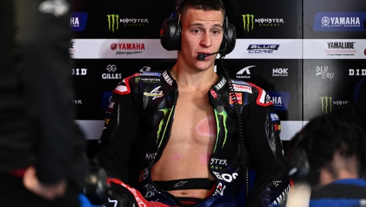 epa10244710 Fabio Quartararo of France riding for Yamaha Factory Racing looks on in the pits during Free Practice 4 for the Australian Motorcycle Grand Prix at the Phillip Island Grand Prix Circuit on Phillip Island, Victoria, Australia, 15 October 2022.  EPA/JOEL CARRETT AUSTRALIA AND NEW ZEALAND OUT