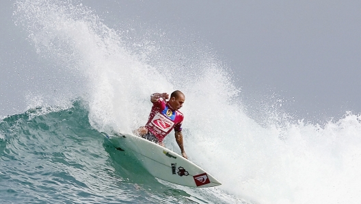 Kelly Slater quando era parte della famiglia Quiksilver. Ph. Pierre Tostee/ASP/Getty images