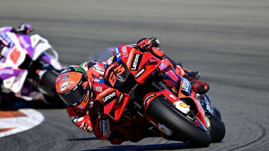 Ducati Italian rider Francesco Bagnaia competes during the Valencia MotoGP Grand Prix race at the Ricardo Tormo racetrack in Cheste, near Valencia, on November 6, 2022. (Photo by JAVIER SORIANO / AFP)