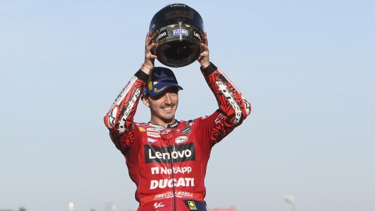 Moto GP World Champion Ducati rider Francesco Bagnaia, of Italy, celebrates at the end of the Valencia Motorcycle Grand Prix, the last race of the season, at the Ricardo Tormo circuit in Cheste, near Valencia, Spain, Sunday, Nov. 6, 2022. (AP Photo/Alberto Saiz)