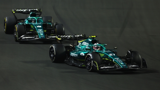 JEDDAH, SAUDI ARABIA - MARCH 27: Nico Hulkenberg of Germany driving the (27) Aston Martin AMR22 Mercedes leads Lance Stroll of Canada driving the (18) Aston Martin AMR22 Mercedes on track during the F1 Grand Prix of Saudi Arabia at the Jeddah Corniche Circuit on March 27, 2022 in Jeddah, Saudi Arabia. (Photo by Lars Baron/Getty Images)