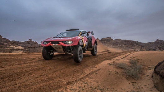 epa10387496 French driver Sebastien Loeb and Belgain co-driver Fabian Lurquin drive their Prodrive Hunter for Bahrain Raid Xtreme team during the third stage of the Dakar Rally 2023 from Alula to Ha'il, Saudi Arabia, 03 January 2023.  EPA/Andrew Eaton