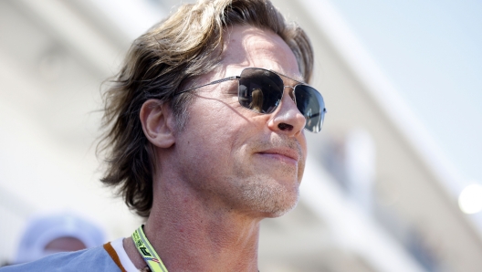 AUSTIN, TEXAS - OCTOBER 21: Brad Pitt walks in the Paddock prior to practice ahead of the F1 Grand Prix of USA at Circuit of The Americas on October 21, 2022 in Austin, Texas.   Jared C. Tilton/Getty Images/AFP