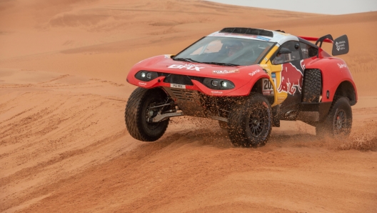 epa10398291 French driver Sebastien Loeb and Belgain co-driver Fabian Lurquin drive their Prodrive Hunter for Bahrain Raid Xtreme team during the 9th stage of the Dakar Rally 2023 from Riyadh to Haradh, Saudi Arabia, 10 January 2023.  EPA/Gerard Laurenssen