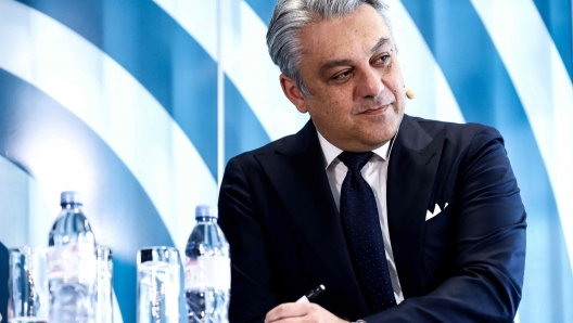 Renault Group's Chief Executive and new European Automobile Manufacturers' Association (ACEA) president Luca De Meo listens during a press conference on the perspectives of the auto industrys drive to zero-emission mobility in Brussels on January 31, 2023. (Photo by Kenzo TRIBOUILLARD / AFP)