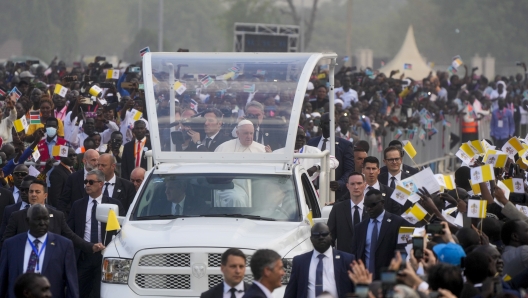 Pope Francis arrives to celebrate mass at the John Garang Mausoleum in Juba, South Sudan, Sunday, Feb. 5, 2023. Francis is in South Sudan on the second leg of a six-day trip that started in Congo, hoping to bring comfort and encouragement to two countries that have been riven by poverty, conflicts and what he calls a "colonialist mentality" that has exploited Africa for centuries. (AP Photo/Gregorio Borgia)