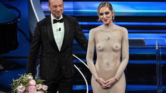 Sanremo Festival host and artistic director Amadeus (L) with Italian fashion blogger, businesswoman and model, Chiara Ferragni (R), on stage at the Ariston theatre during the 73rd Sanremo Italian Song Festival, in Sanremo, Italy, 07 February 2023. The music festival will run from 07 to 11 February 2023.  ANSA/ETTORE FERRARI