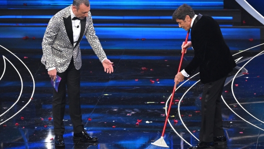 Sanremo Festival host and artistic director Amadeus (L) and  Italian singer and Sanremo Festival co-host Gianni Morandi (R) on stage at the Ariston theatre during the 73rd Sanremo Italian Song Festival, in Sanremo, Italy, 07 February 2023. The music festival will run from 07 to 11 February 2023.  ANSA/ETTORE FERRARI