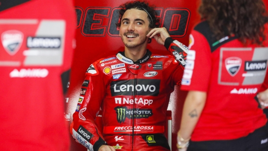 epa10458550 Italian MotoGP rider Francesco Bagnaia of Ducati Lenovo Team prepares in his team's garage during the MotoGP pre-season test session on the Sepang International Circuit, in Sepang, Malaysia, 10 February 2023.  EPA/FAZRY ISMAIL