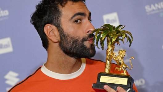 Italian singer Marco Mengoni poses with the prize after winning the Sanremo Italian Song Festival, in Sanremo, Italy, 12 February 2023. The 73rd Festival Della Canzone Italiana music festival runs from 07 to 11 February 2023. ANSA/ETTORE FERRARI