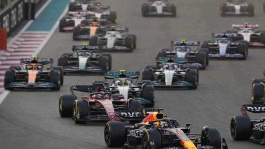 Red Bull driver Max Verstappen of the Netherlands leads at the start during the Formula One Abu Dhabi Grand Prix, in Abu Dhabi, United Arab Emirates Sunday, Nov. 20, 2022. (AP Photo/Hussein Malla)