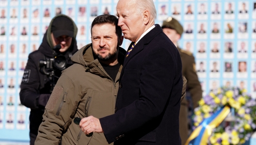 TOPSHOT - US President Joe Biden (R) is greeted by Ukrainian President Volodymyr Zelensky (L) during a visit in Kyiv on February 20, 2023. - US President Joe Biden made a surprise trip to Kyiv on February 20, 2023, ahead of the first anniversary of Russia's invasion of Ukraine, AFP journalists saw. Biden met Ukrainian President Volodymyr Zelensky in the Ukrainian capital on his first visit to the country since the start of the conflict. (Photo by Dimitar DILKOFF / AFP)