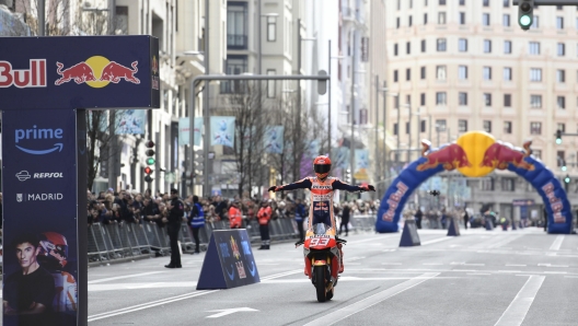 epa10477425 Motorcycle rider Marc Marquez makes an exhibition at the Gran Via in Madrid on the occasion of the Prime Video series 'Marc Marquez ALL IN' in Madrid, central Spain, 19 February 2023. The series tells the story of Marquez' three-year-long recovery process from the moment of the pilot's injury in Jerez racetrack in Andalusia, southern Spain, until his last operation in mid-2022.  EPA/VICTOR LERENA