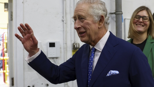 Britain's King Charles visits a food bank in Milton Keynes, Britain, Thursday Feb. 16, 2023. (Molly Darlington/Pool via AP)